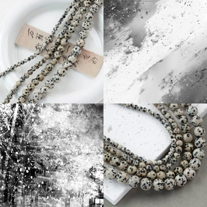 Detailed view of polished Dalmatian Jasper beads in various sizes for DIY jewelry