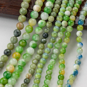 Strands of natural green jade round beads for DIY jewelry making with smooth polished finish