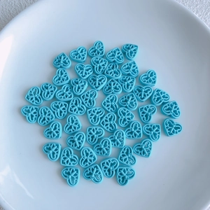 Sky blue heart-shaped hollow beads with butterfly patterns for DIY jewelry making