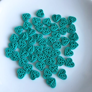 Tiffany blue hollow heart beads with intricate patterns for DIY jewelry making and crafts