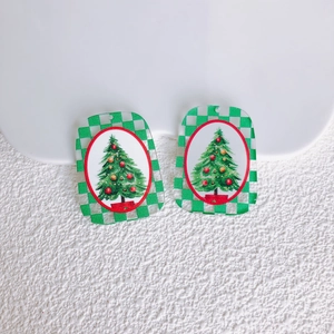 Dettaglio di pendenti per albero di Natale in acrilico con bordo a scacchi verdi per DIY