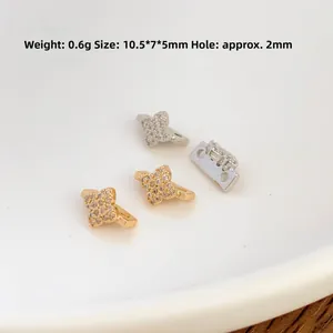 Gold and silver plated four-leaf flower charms with pavé cubic zirconia for DIY jewelry