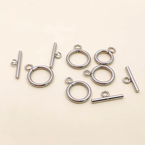 Macro view of polished stainless steel OT toggle clasps for DIY jewelry making