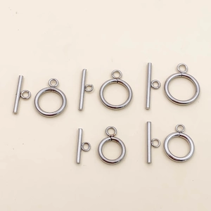 Close-up of polished stainless steel OT toggle clasps for jewelry DIY making