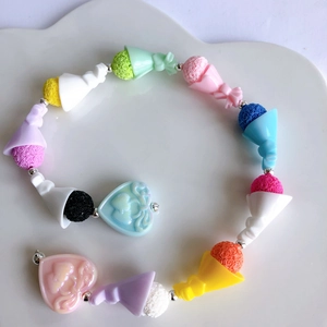 Colorful candy-colored bow and ice cream cone charms for DIY bracelet making