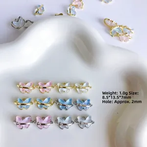 Pendentifs papillon en résine onirique avec cadres métalliques pour bijoux DIY