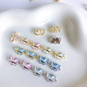 Pendentifs papillons en résine avec anneaux d'étoiles pour la création de bijoux DIY