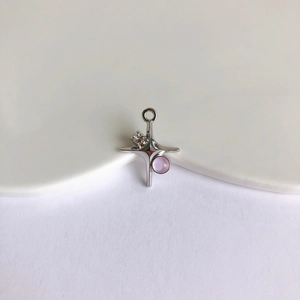 Detail of silver star pendant with lavender gemstone and clear zircon for DIY jewelry