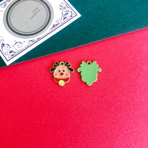 Detailed view of DIY reindeer charm with red nose, green antlers and top hanging loop