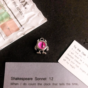 Funny monster alloy pendant featuring a pink cat-eye pupil for DIY jewelry making