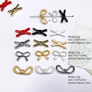 Nœuds papillon et breloques en alliage pour création de bijoux DIY en diverses couleurs
