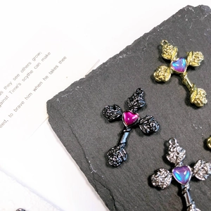 Gothic cross pendants with roses and heart-shaped crystals in gold, silver and black