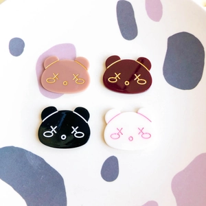Set of four colorful acrylic raccoon charms for DIY hair clips and jewelry making