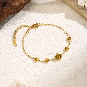 Exquisite gold stainless steel bracelet featuring five 3D camellia flower charms for women
