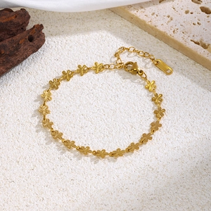 18K gold plated hollow floral stainless steel bracelet for women with lobster clasp