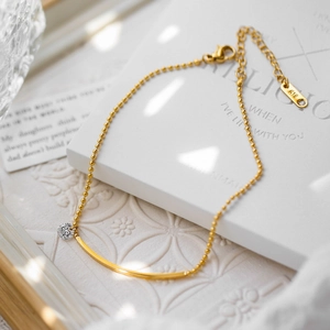 Minimalist 18K gold plated anklet with curved metal tube and sparkling zircon stone