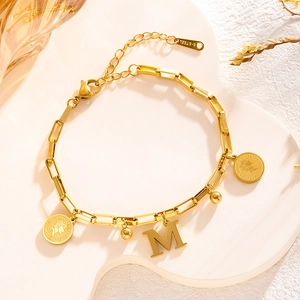 Gold plated stainless steel coin bracelet with initial M charm and round ball pendants