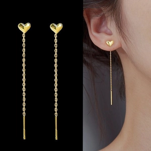 Elegant 18K gold-plated heart long chain drop earrings for women on a dark background