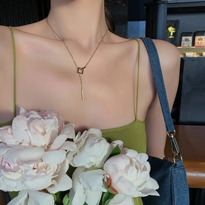 Minimalist Y-shaped titanium steel square interlocking tassel necklace in gold finish