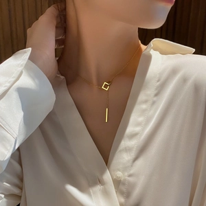Gold titanium steel Y-shaped necklace with geometric square and tassel pendant for women