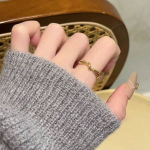 Minimalist gold knot Mobius ring for women crafted in high-quality stainless steel