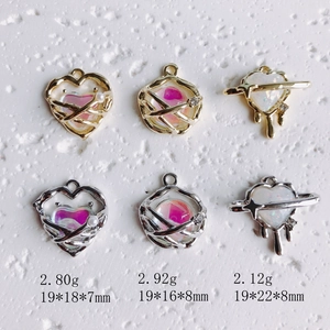 DIY jewelry pendants with melting heart and star designs in gold and silver plating