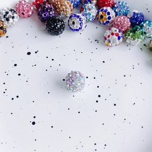 Macro shot of 10mm colorful rhinestone crystal disco beads for DIY jewelry making