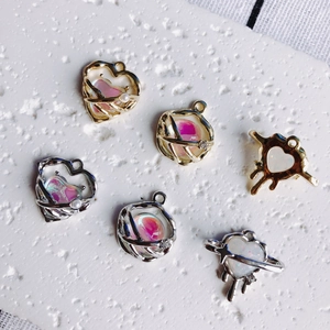 DIY jewelry charms set with melting hearts and stars in gold and silver finish