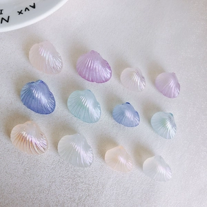 Macro view of colorful iridescent seashell beads for DIY jewelry making and crafts