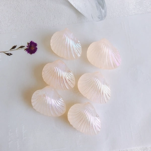 Macro shot of iridescent mermaid-style shell beads for DIY jewelry making