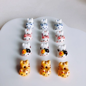 Perline fai-da-te in ceramica Maneki Neko e tigre per gioielli in set da 12