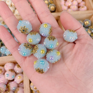 Handcrafted colorful Nepalese-style resin beads with gold metal caps for DIY jewelry