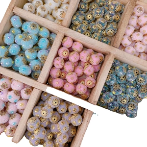 Ethnic Nepal beads DIY jewelry accessories with golden petal metal caps in wooden box