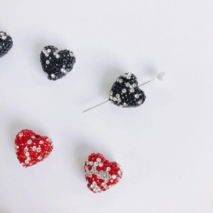 Sparkling heart-shaped rhinestones charms with red and black polka dot patterns for DIY crafts