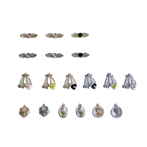 Assorted DIY alloy charms including wings, hearts, and tulip pendants for jewelry making