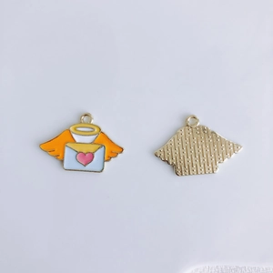 Detailed view of enamel alloy angel envelope charms with orange wings for DIY jewelry