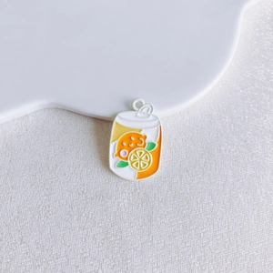 Macro detail of alloy cartoon soda can pendant with colorful orange and lemon drip oil design