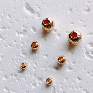 Perline rotonde in oro 14K con motivi a spirale per la creazione di gioielli fai-da-te