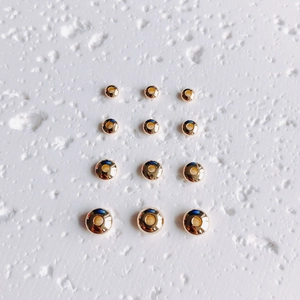 Polished 14K gold filled round spacer beads for DIY jewelry making with smooth mirror finish