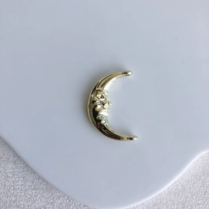 Golden crescent moon face connector with dual holes for DIY jewelry making
