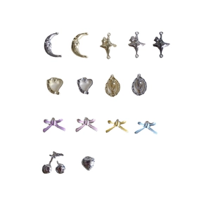 Assorted alloy jewelry charms featuring moon, heart, and bow designs for DIY necklaces