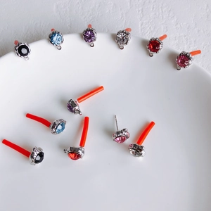Sparkling crystal stud earring set with faceted gemstones in colorful claw settings
