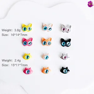 Flat lay of cute monster cat beads for DIY jewelry with specific weight and size details