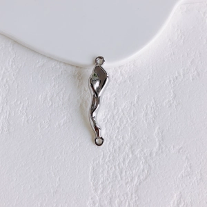 Macro view of polished silver irregular organic link for DIY necklace jewelry making