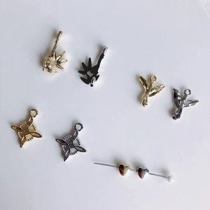 Détails de breloques en forme de feuille de bambou et étoile pour bijoux DIY