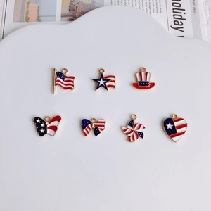Detailed macro view of July 4th American flag theme alloy charms for DIY jewelry