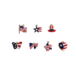 7-piece set of USA flag themed enamel alloy charms with patriotic star and bow designs