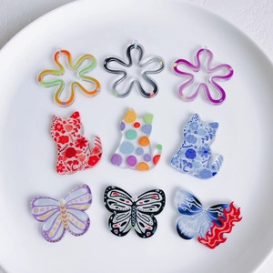 DIY acrylic charms set featuring floral, cat, and butterfly designs for jewelry making