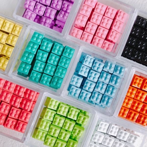 Colorful macaron square block beads for DIY jewelry making in a plastic organizer box