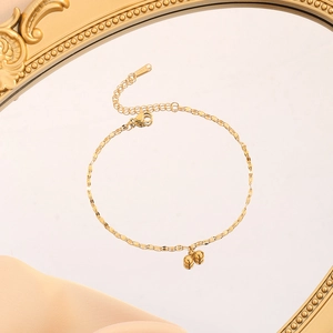 Minimalist gold titanium steel chain bracelet featuring dual shiny ball pendants